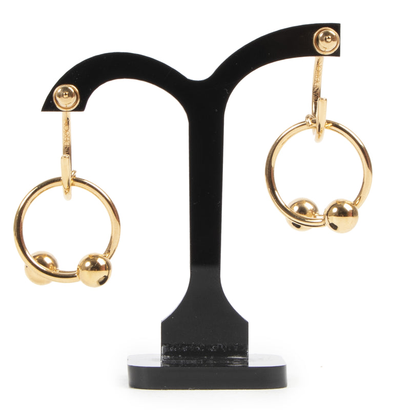J.W. Anderson Golden Pierce Earrings. Authentieke J.W. Anderson accessoires bij LabelLOV Antwerpen. Authentique seconde-main luxury en ligne webshop LabelLOV. Authentic J.W. Anderson accessories at LabelLOV Antwerp.