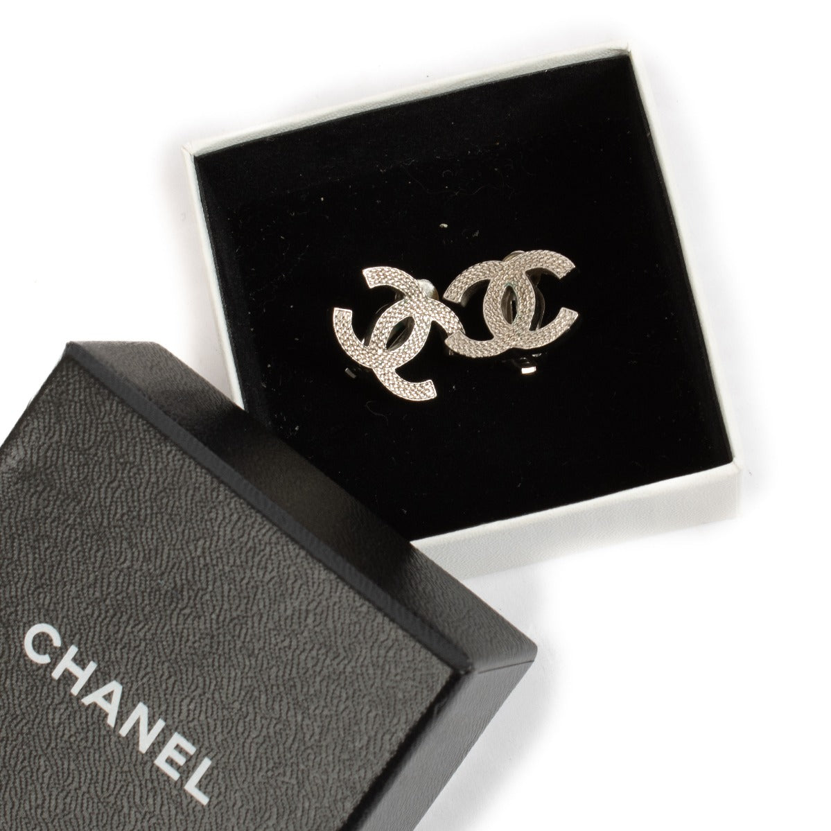 authentic pre loved Chanel CC Silver Clip-on Earrings on Labellov.com