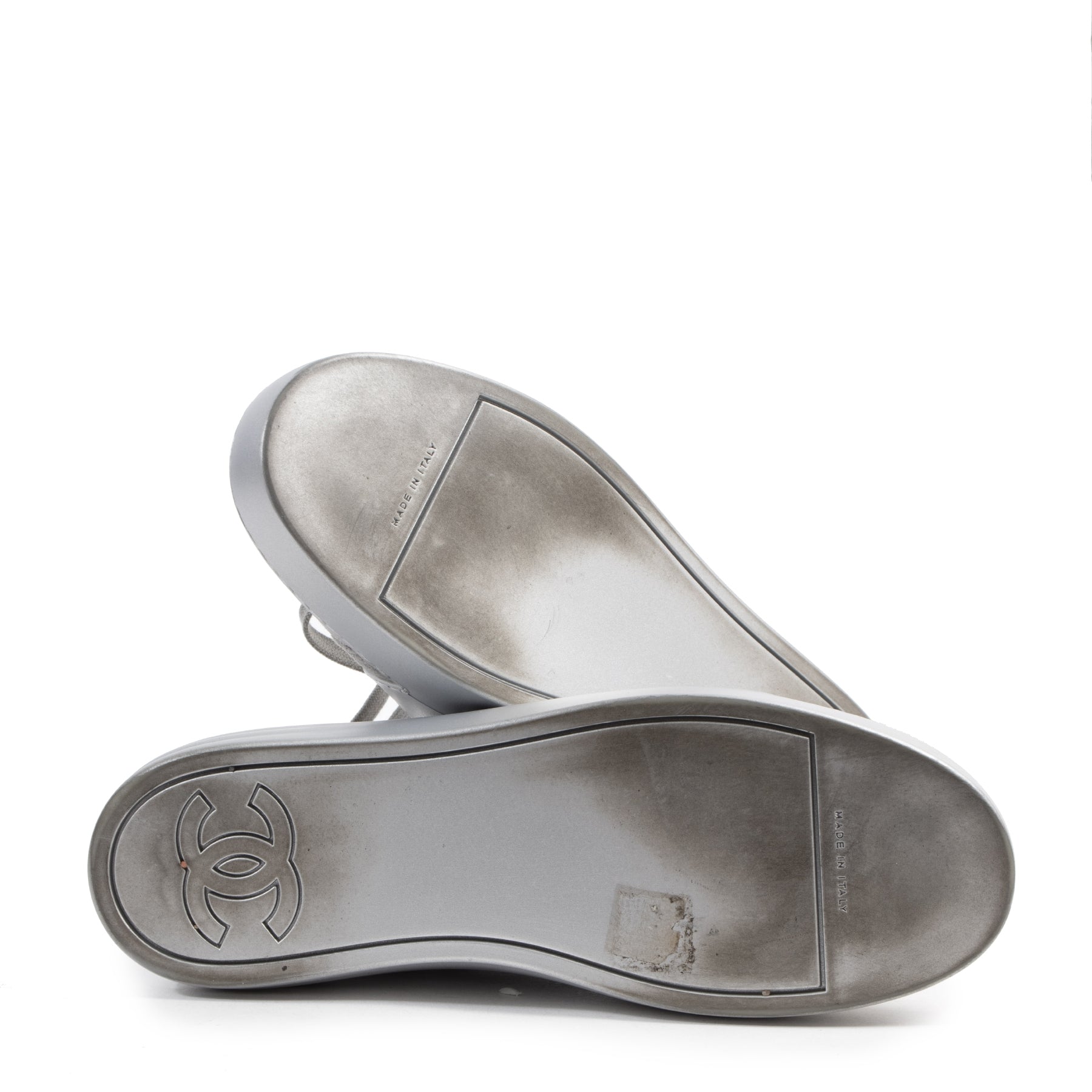 We buy and sell your authentic designer Chanel Silver Suede Sneakers