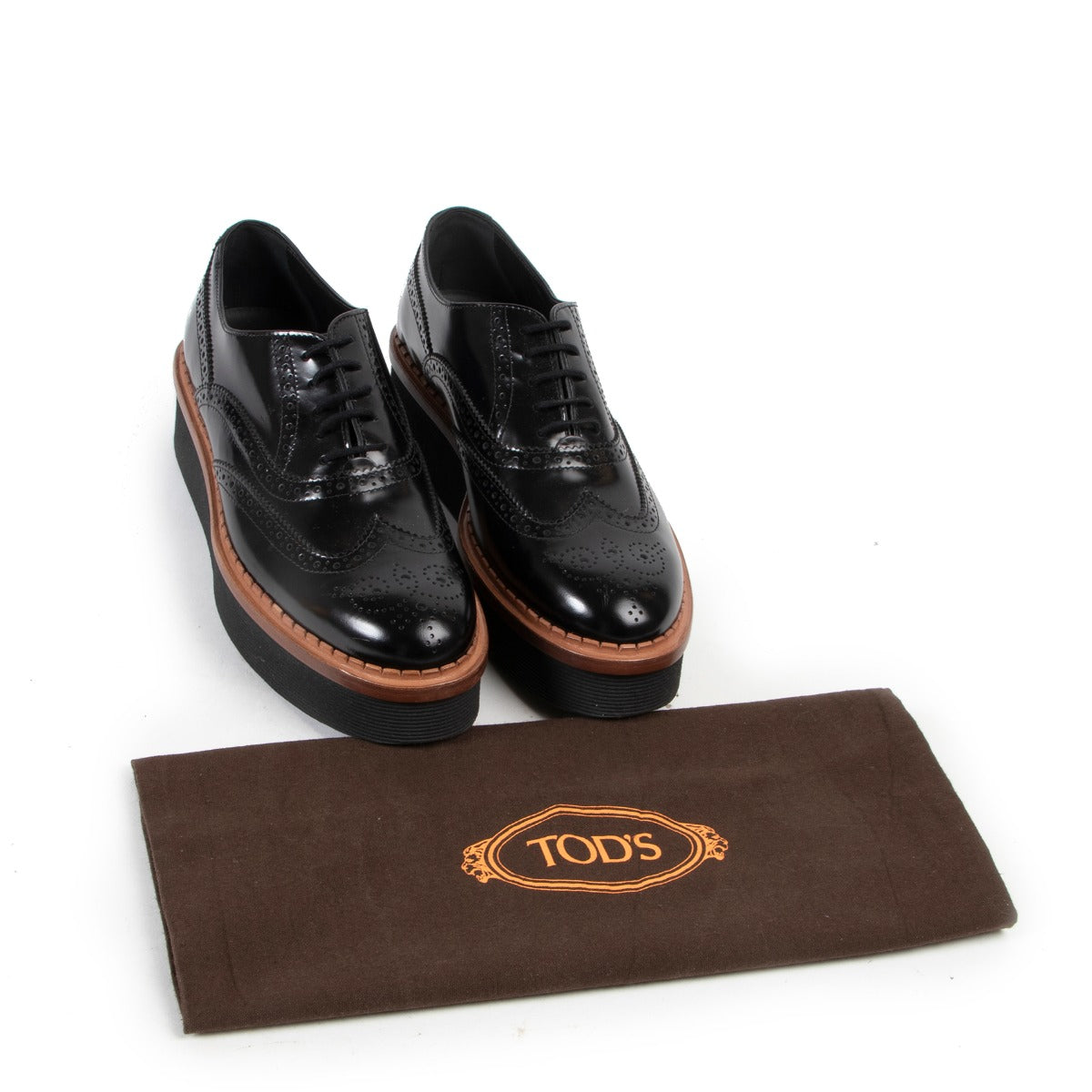 Buy and sell your designer items such as these Tod's Leather Black Flats in very good condition