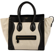 Céline Mini Bicolor Toile Luggage Top Handle Bag for the best price at Labellov secondhand luxury in Antwerp. We buy and sell your authentic designer bags for the best price.