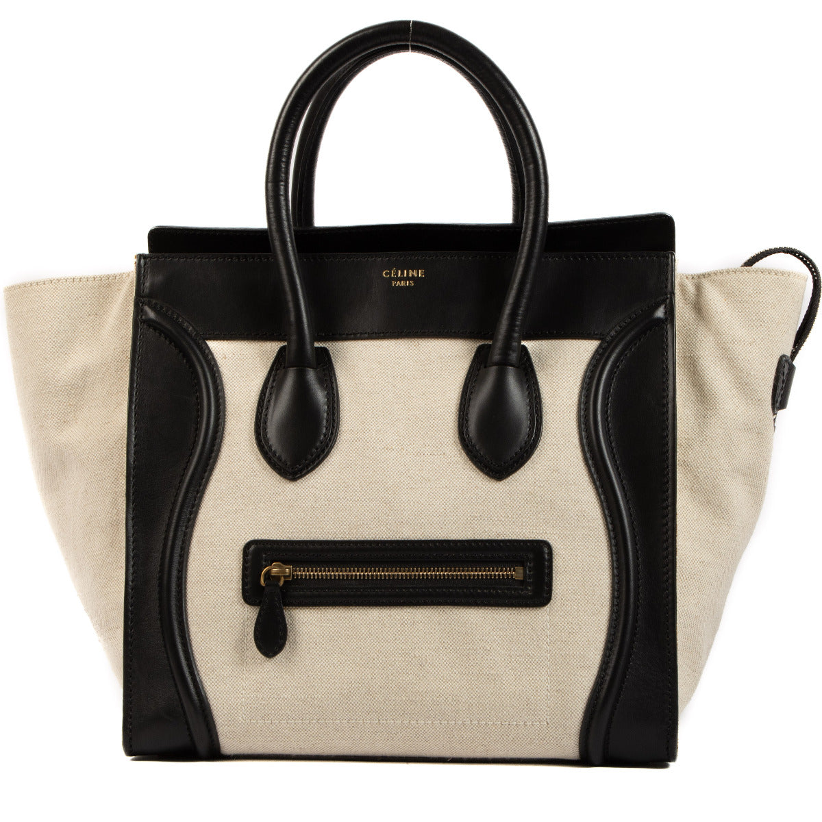 Céline Mini Bicolor Toile Luggage Top Handle Bag for the best price at Labellov secondhand luxury in Antwerp. We buy and sell your authentic designer bags for the best price.