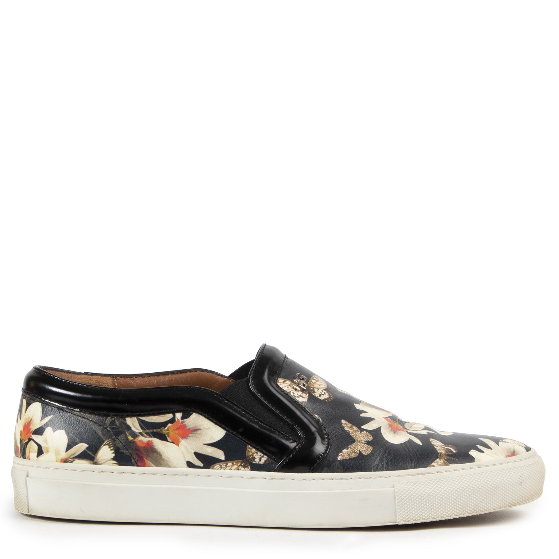 Givenchy Magnolia Print Slip-Ons for the best price at Labellov secondhand luxury