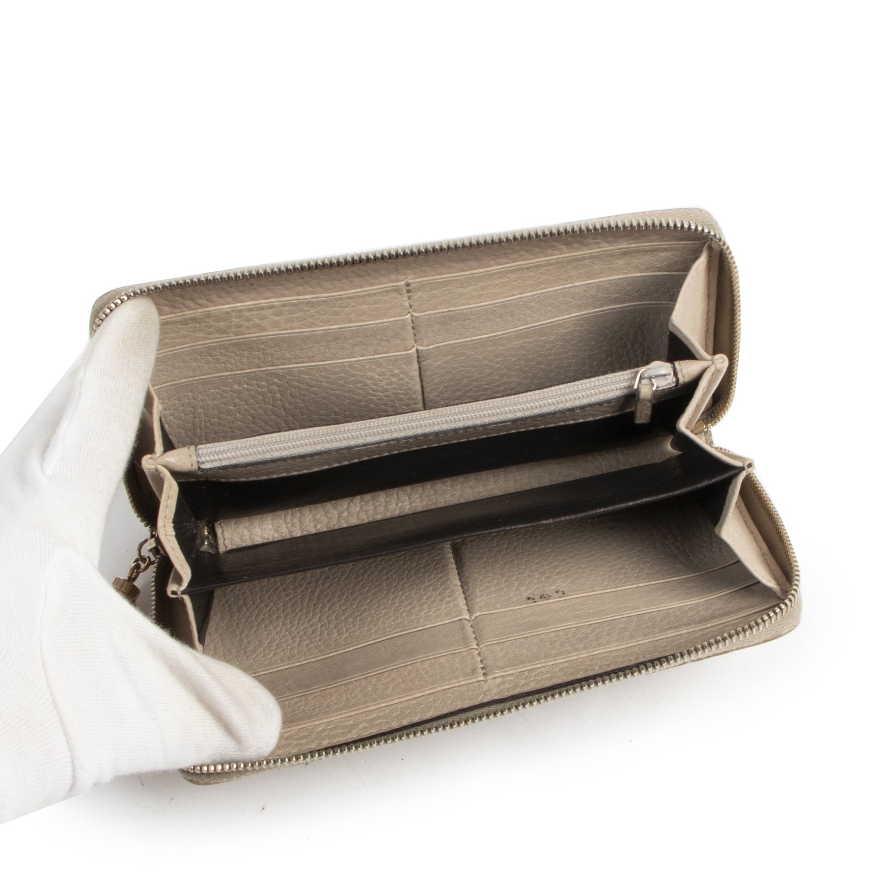 For the best price buy online Gucci Monogram Embossed Zipper Wallet