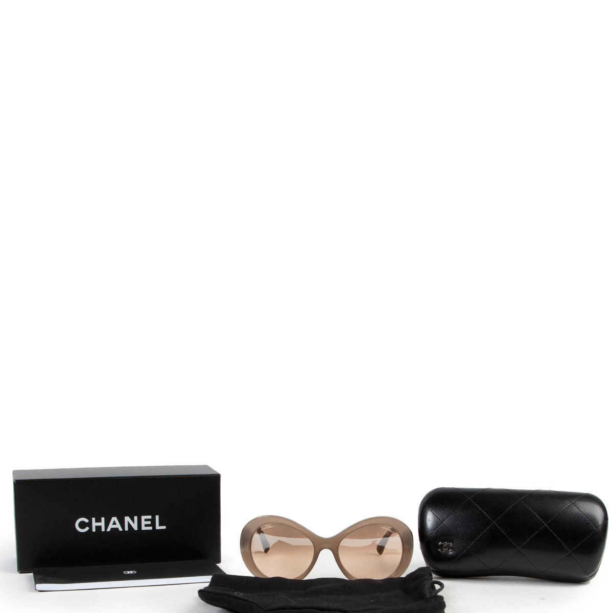Buy these Chanel Sunglasses Beige in good condition online or in store.