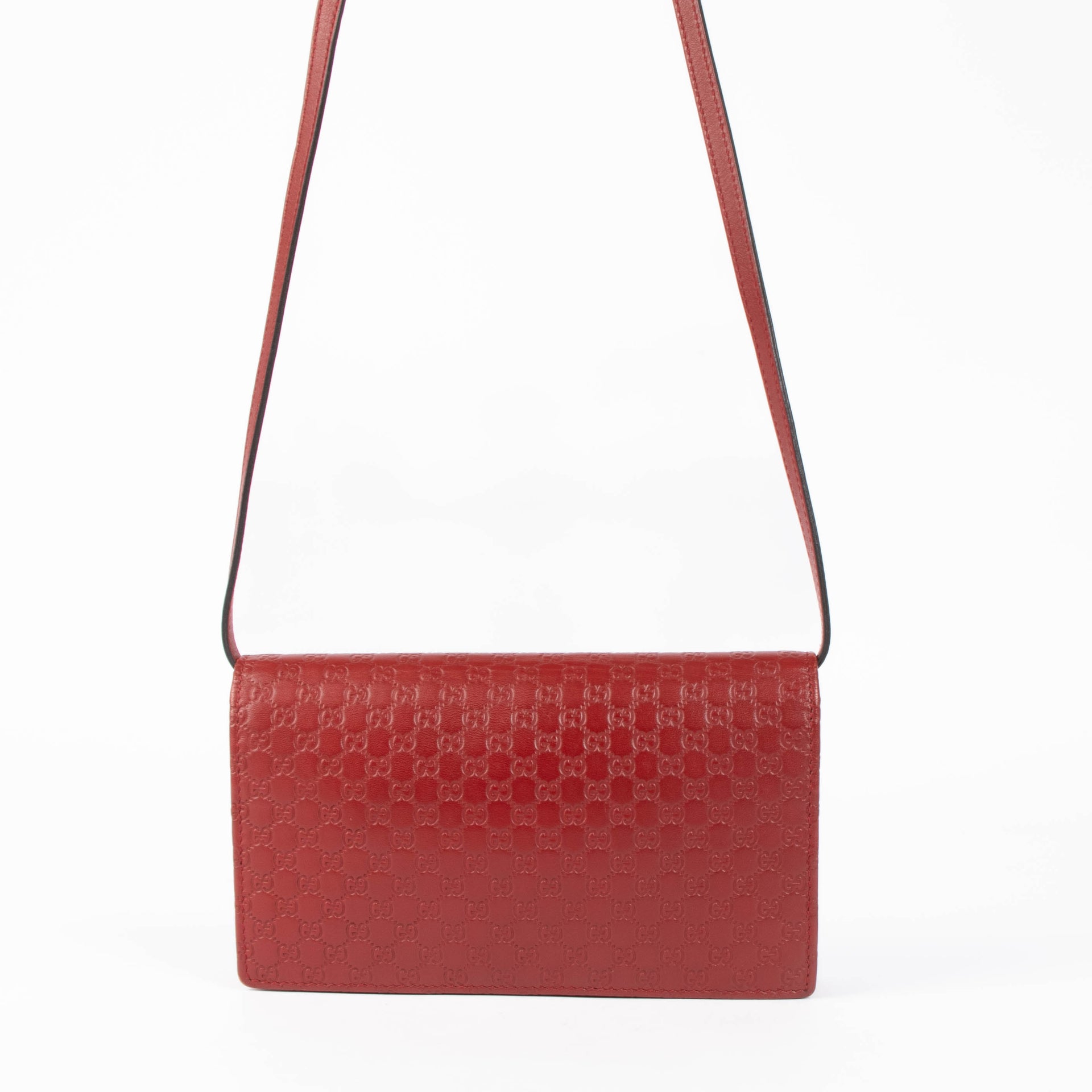 Portefeuille Gucci Guccissima rouge avec bandoulière
