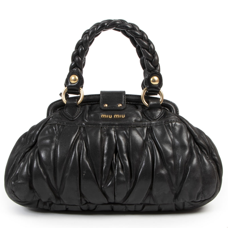 Miu Miu Black Pleated Shoulder Bag kopen en verkopen aan de beste prijs