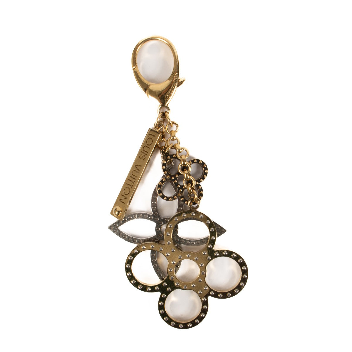 Shop safe online at Labellov in Antwerp, Brussels and Knokke this 100% authentic second hand Louis Vuitton Gold Monogram Key Chain