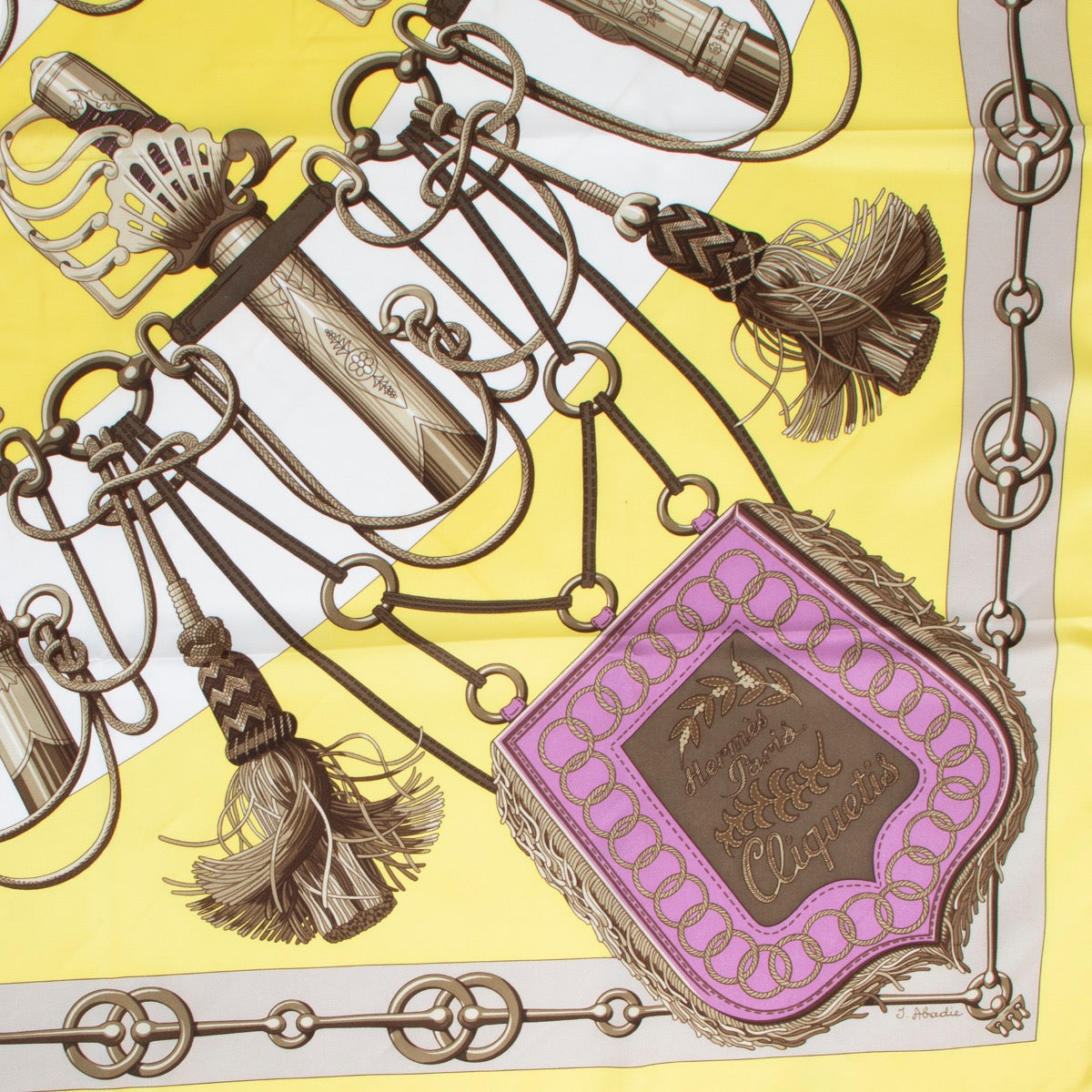Buy this Hermès Yellow Cliquetis Scarf at Labellov online or come by in our showroom at Antwerp. Get this scarf for a reasonable price and in good condition.