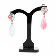 Buy online authentic second hand Chanel pink/blue CC clip-on earrings in very good condition at Labellov in Antwerp.