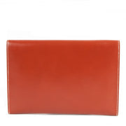 Buy online an authentic second hand Hermès Orange Leather Rio Clutch in very good condition at Labellov in Antwerp.