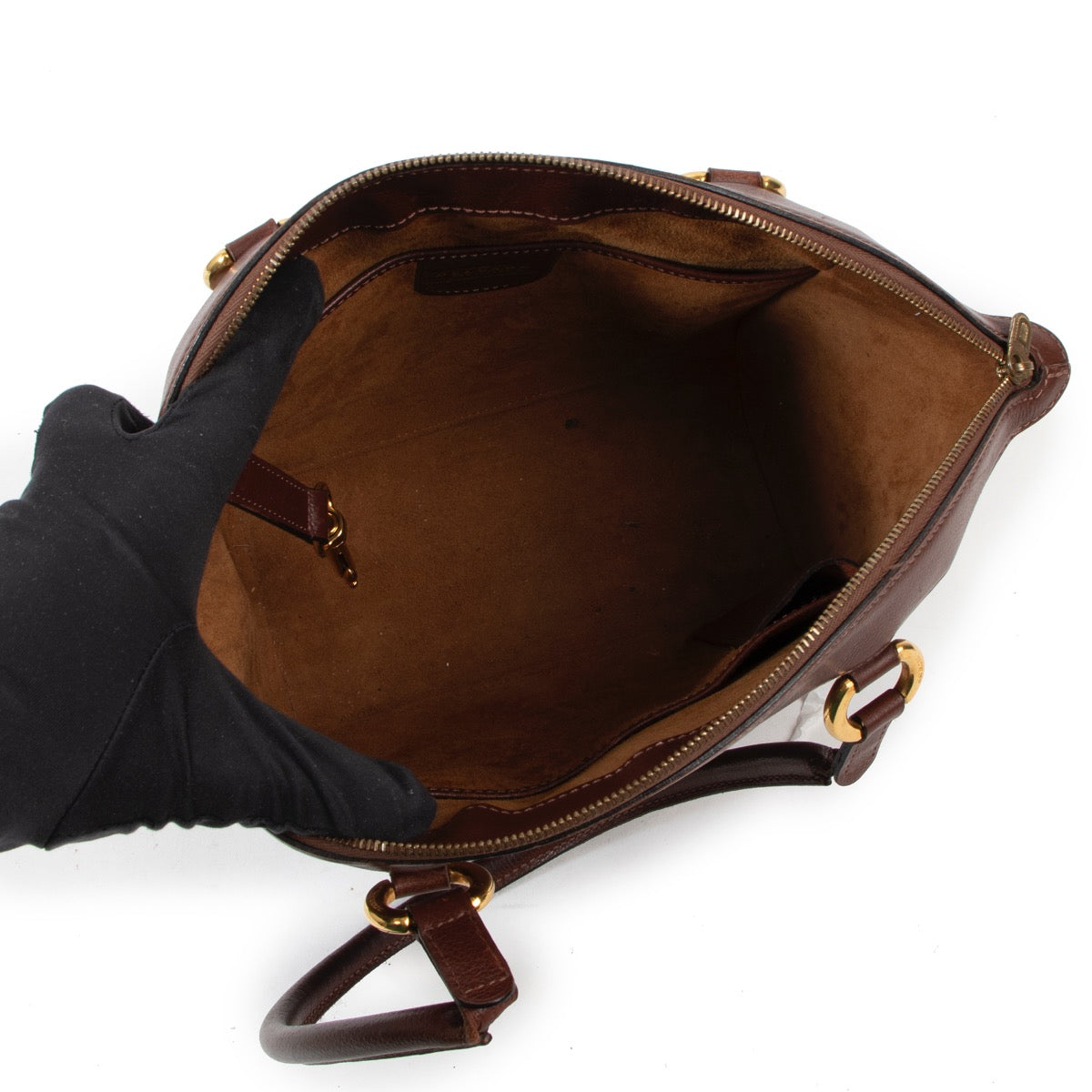 Shop safe online at Labellov in Antwerp this 100% authentic second hand Delvaux Brown Leather Charme Top Handle