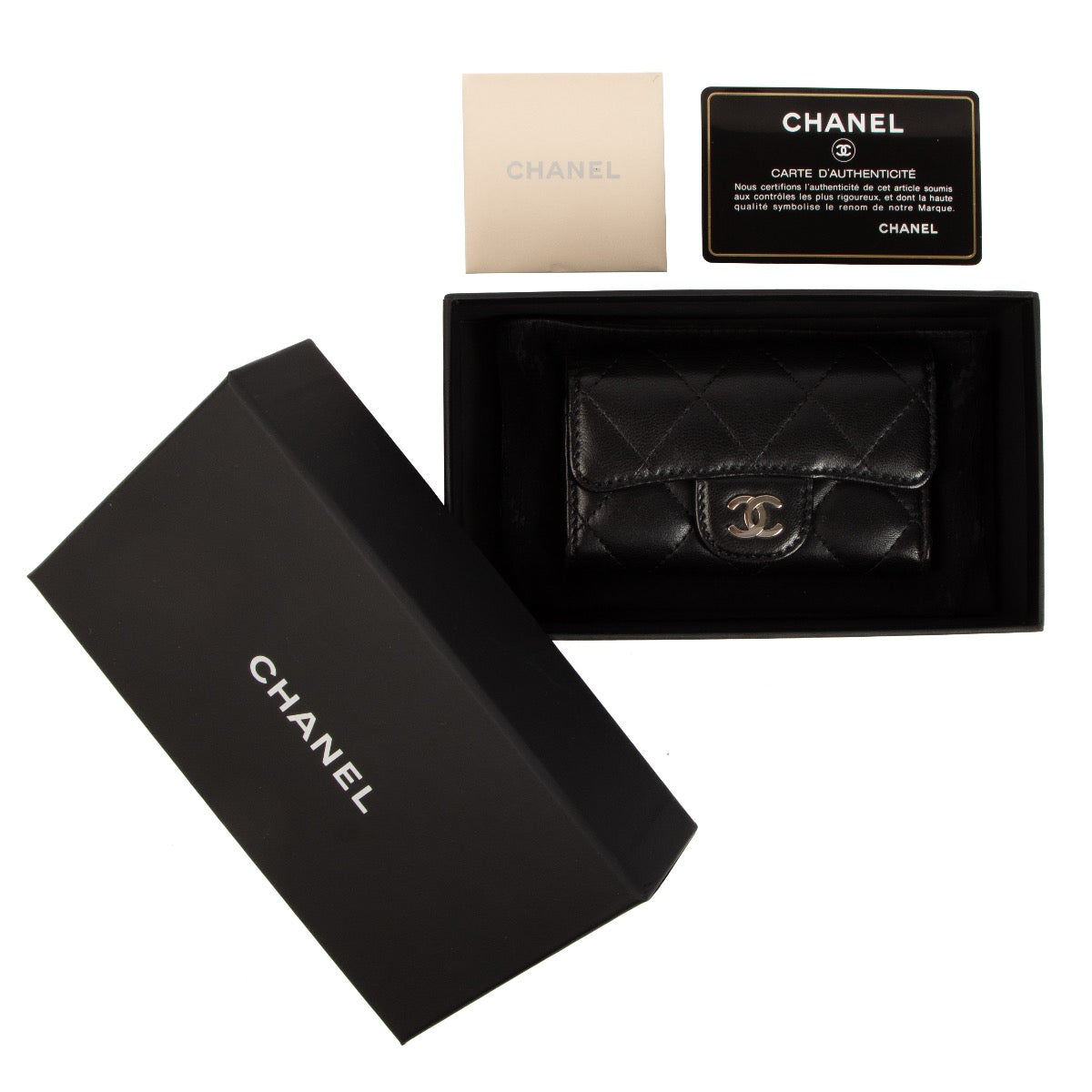 Shop 100% authentic second-hand Chanel Black Quilted 6 Key Holder on Labellov.com