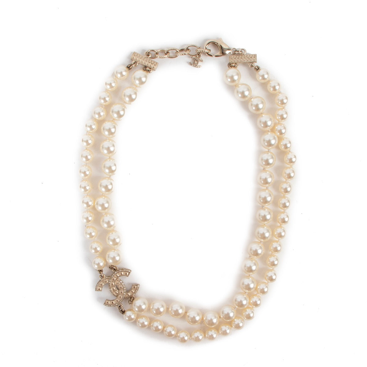 Buy an authentic second hand Chanel Faux Pearl Necklace with Interlocking CC Logo in very good condition at Labellov