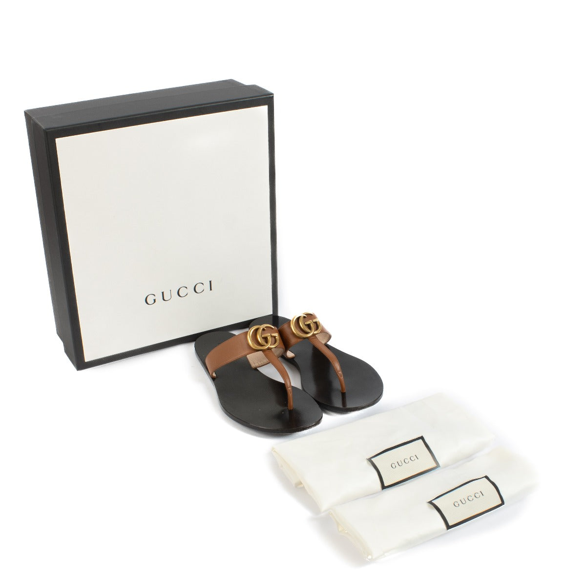 Shop safe online at Labellov in Antwerp, Brussels and Knokke this 100% authentic second hand Gucci Brown GG Marmont Thong Sandals - Size 37