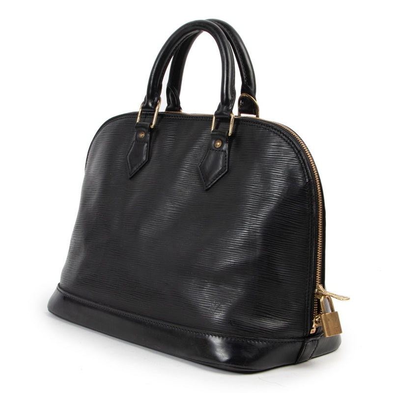 Shop safe online 100% authentic second hand Louis Vuitton Black Epi Leather Alma at the right price at labellov in Antwerp.