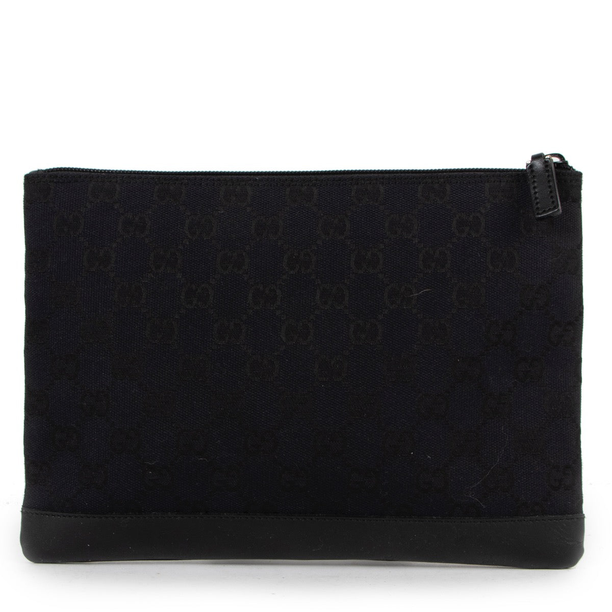 Shop safe online at Labellov in Antwerp this 100% authentic second hand Gucci Black Monogram Canvas Enveloppe Clutch