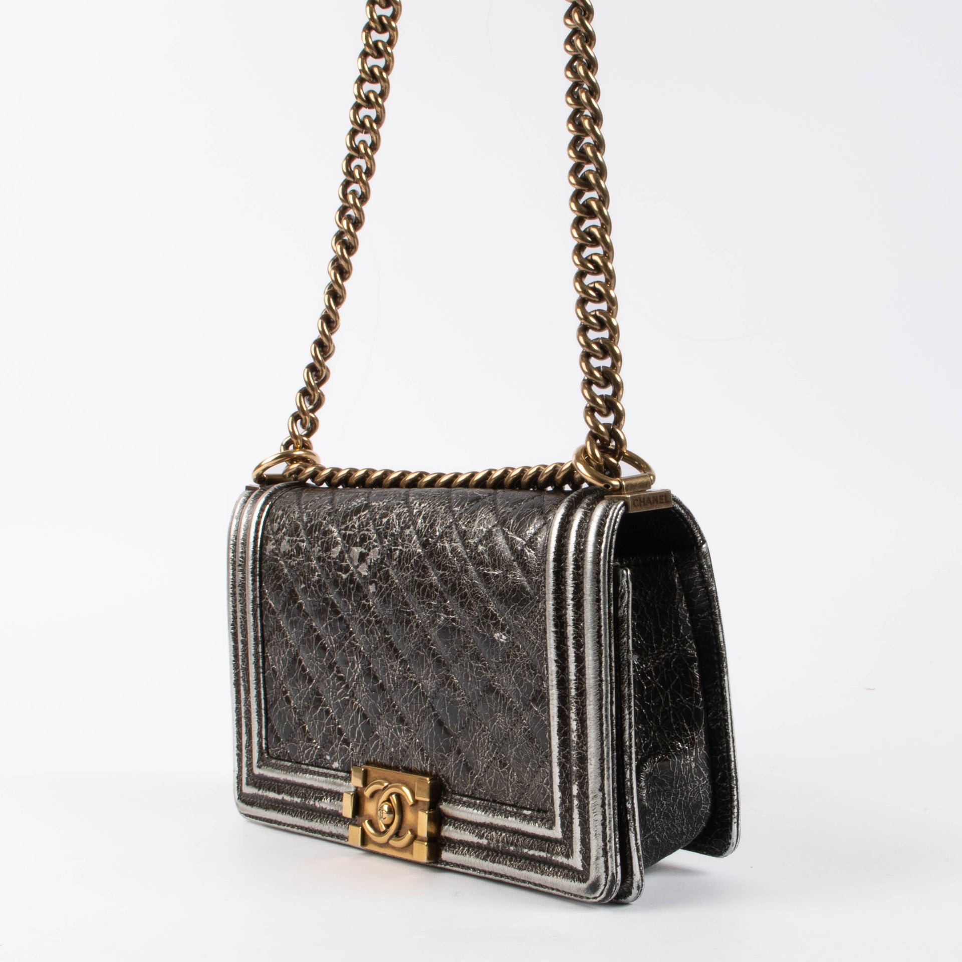 Shop this authentic Chanel Black Crackled Leather Medium Chanel Boy bag pre-loved on Labellov.com