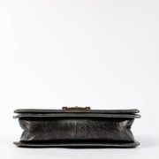 Shop this authentic Chanel Black Crackled Leather Medium Chanel Boy bag pre-loved on Labellov.com