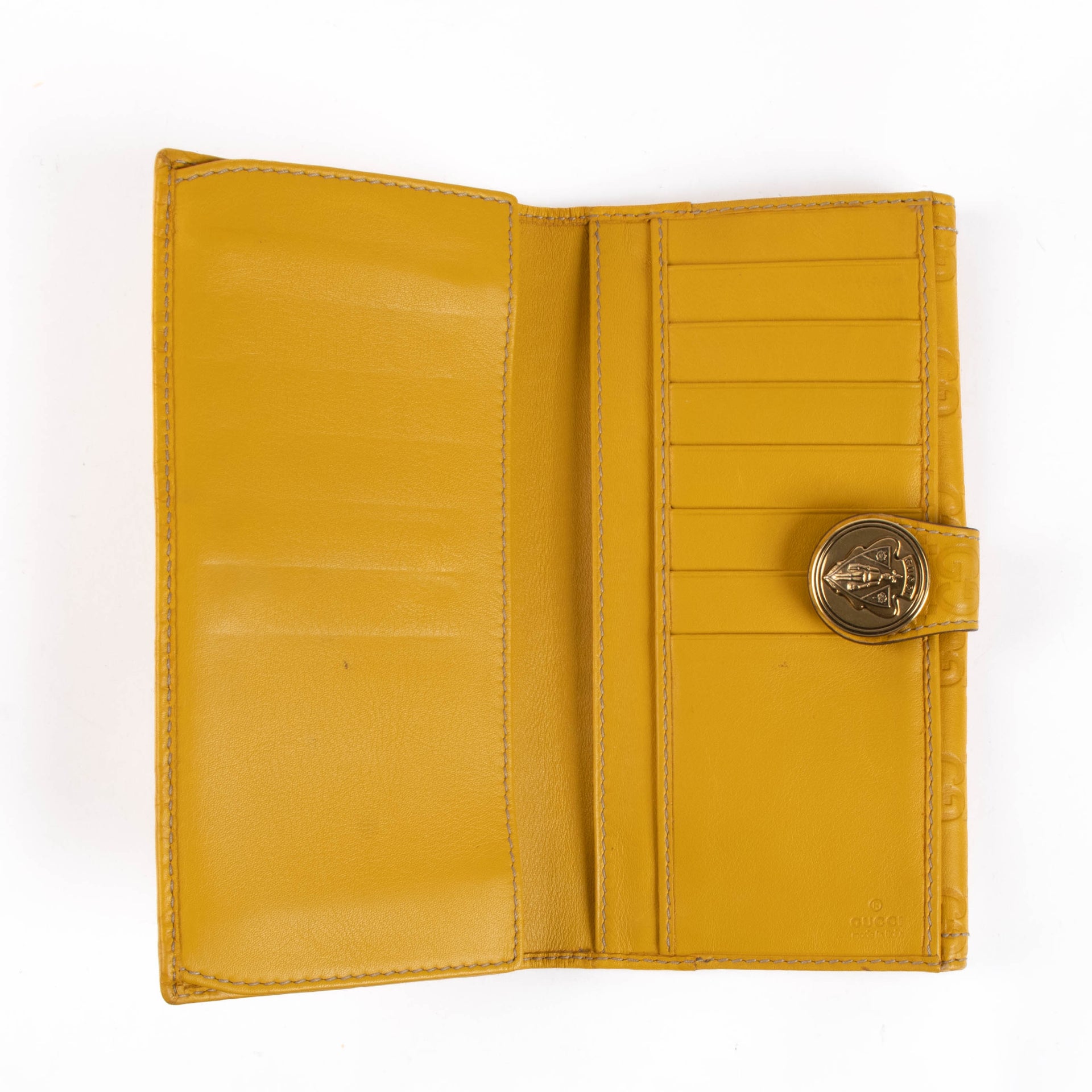 Shop this authentic Gucci Yellow Guccissima Crest Wallet pre-loved on Labellov.com