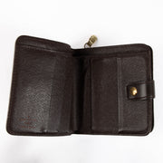 Shop this authentic Louis Vuitton Damier Ebene Wallet pre-loved on Labellov.com