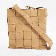 Shop safe online at Labellov in Antwerp, Brussels and KNokke this 100% authentic second hand Bottega Veneta Beige Cassette Messenger Bag