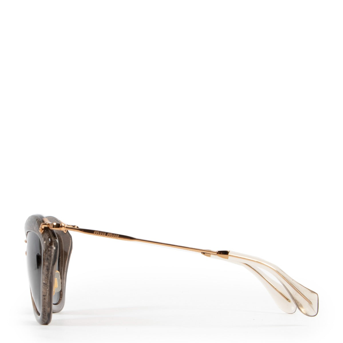 Miu Miu Noir with Golden Glitter Sunglasses Buy this unique piece here safely!