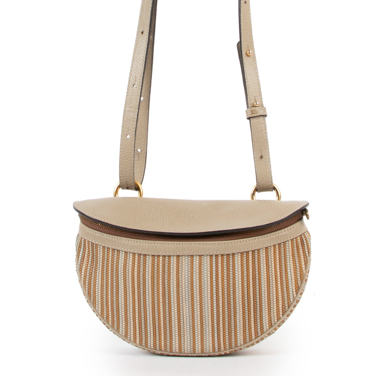 Shop online second hand vintage Delvaux Beige Toile De Cuir Mini Shoulder Bag at Labellov.