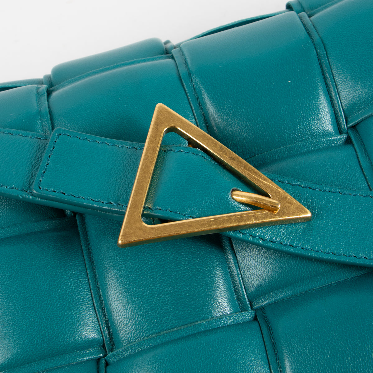 Shop the authentic Bottega Veneta Turquoise Lambskin Padded Cassette Bag on Labellov.com.
