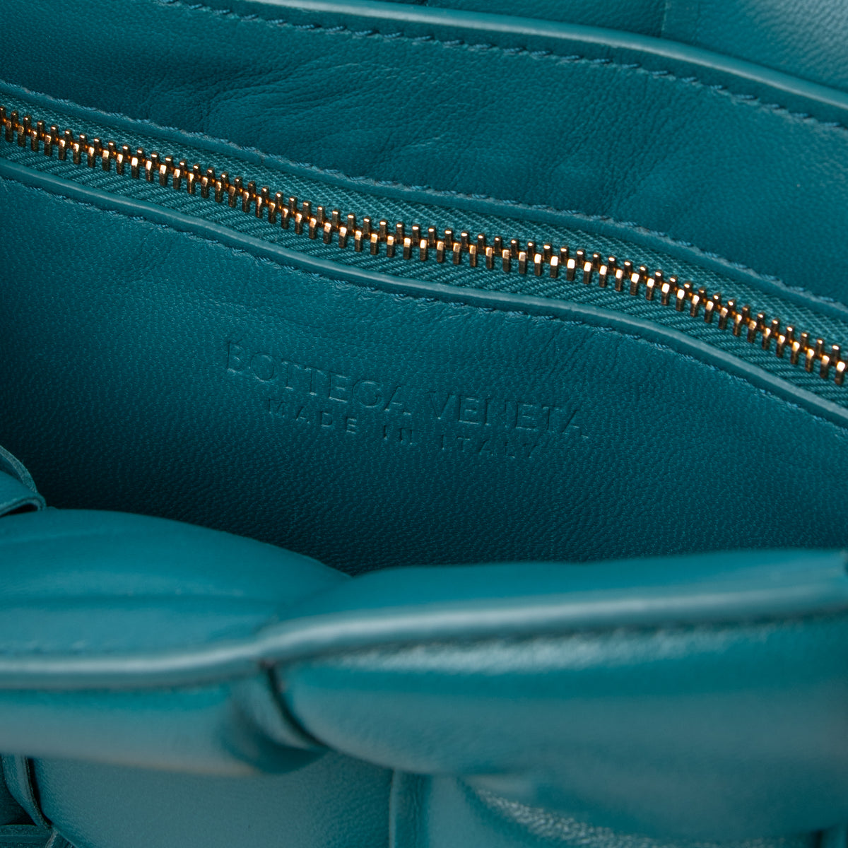 Shop the authentic Bottega Veneta Turquoise Lambskin Padded Cassette Bag on Labellov.com.