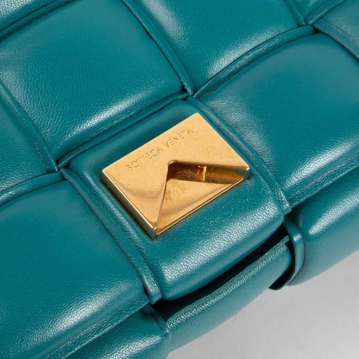 Shop the authentic Bottega Veneta Turquoise Lambskin Padded Cassette Bag on Labellov.com.