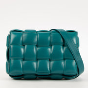 Shop the authentic Bottega Veneta Turquoise Lambskin Padded Cassette Bag on Labellov.com.