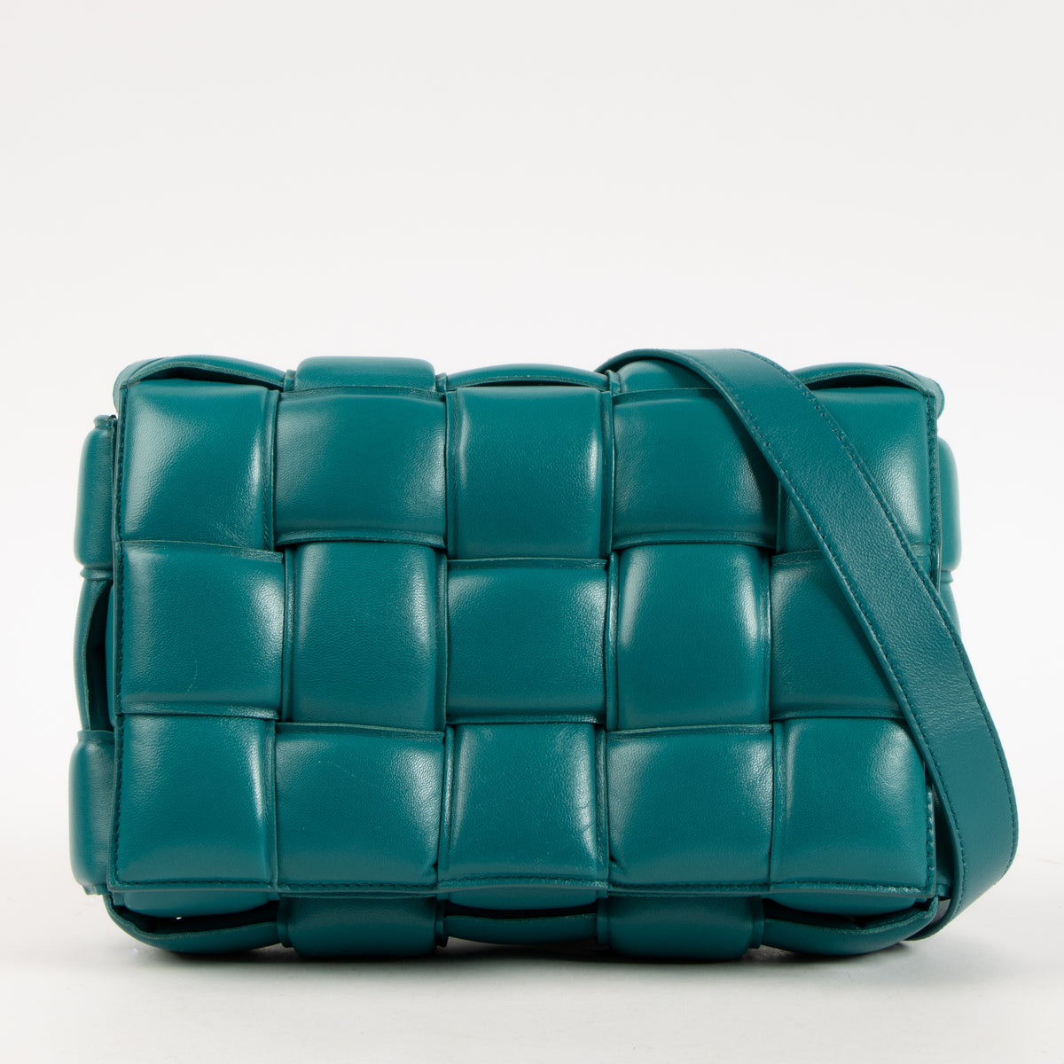 Shop the authentic Bottega Veneta Turquoise Lambskin Padded Cassette Bag on Labellov.com.