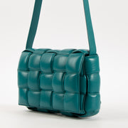 Shop the authentic Bottega Veneta Turquoise Lambskin Padded Cassette Bag on Labellov.com.