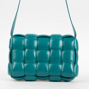 Shop the authentic Bottega Veneta Turquoise Lambskin Padded Cassette Bag on Labellov.com.