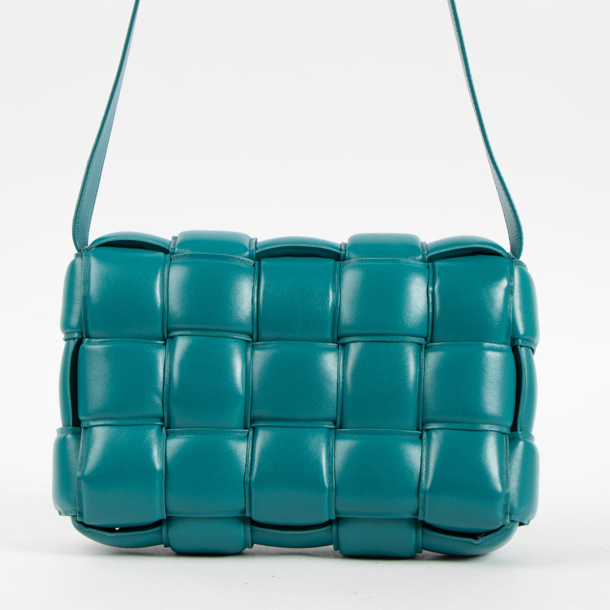 Shop the authentic Bottega Veneta Turquoise Lambskin Padded Cassette Bag on Labellov.com.