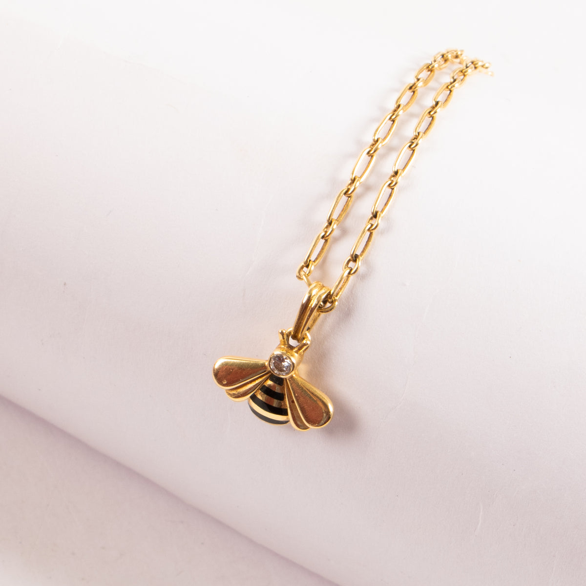 Shop this authentic Cartier Diamond Yellow Gold Bee Pendant Necklace pre-loved on Labellov.com