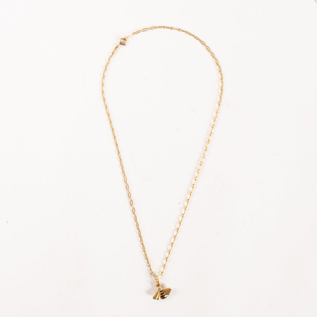 Shop this authentic Cartier Diamond Yellow Gold Bee Pendant Necklace pre-loved on Labellov.com