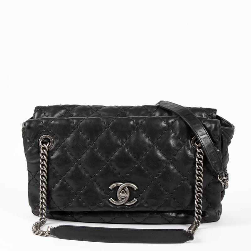 Shop this authentic Chanel Black Ultimate Stitch Top Zip Flap Bag pre-loved on Labellov.com 