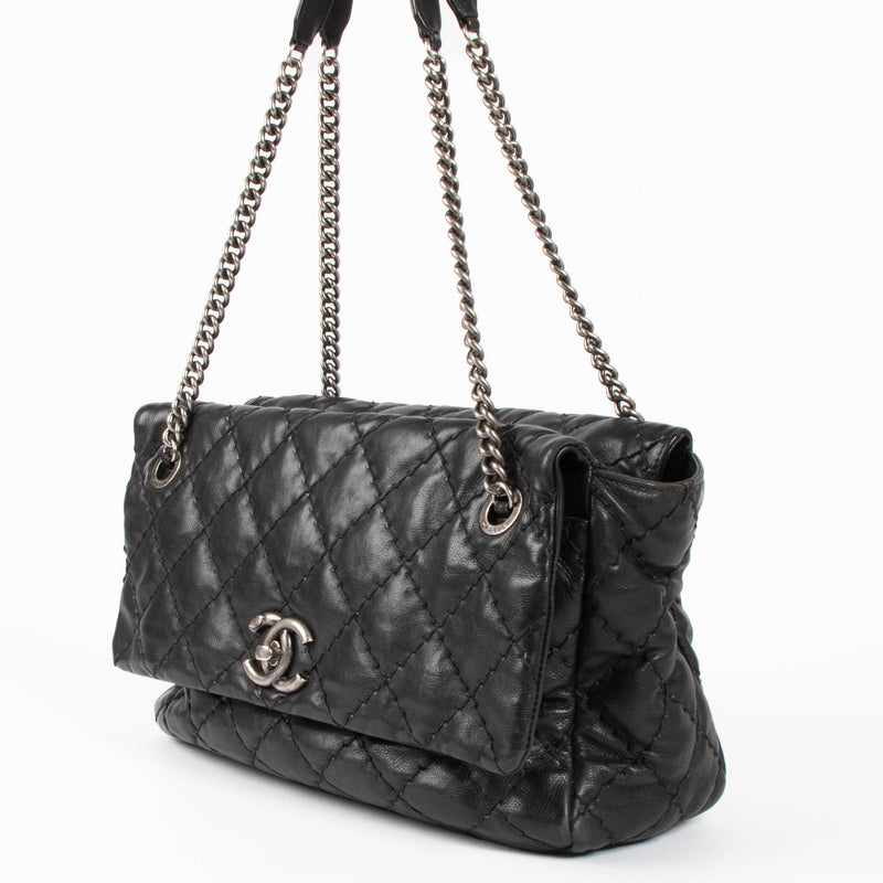 Shop this authentic Chanel Black Ultimate Stitch Top Zip Flap Bag pre-loved on Labellov.com 