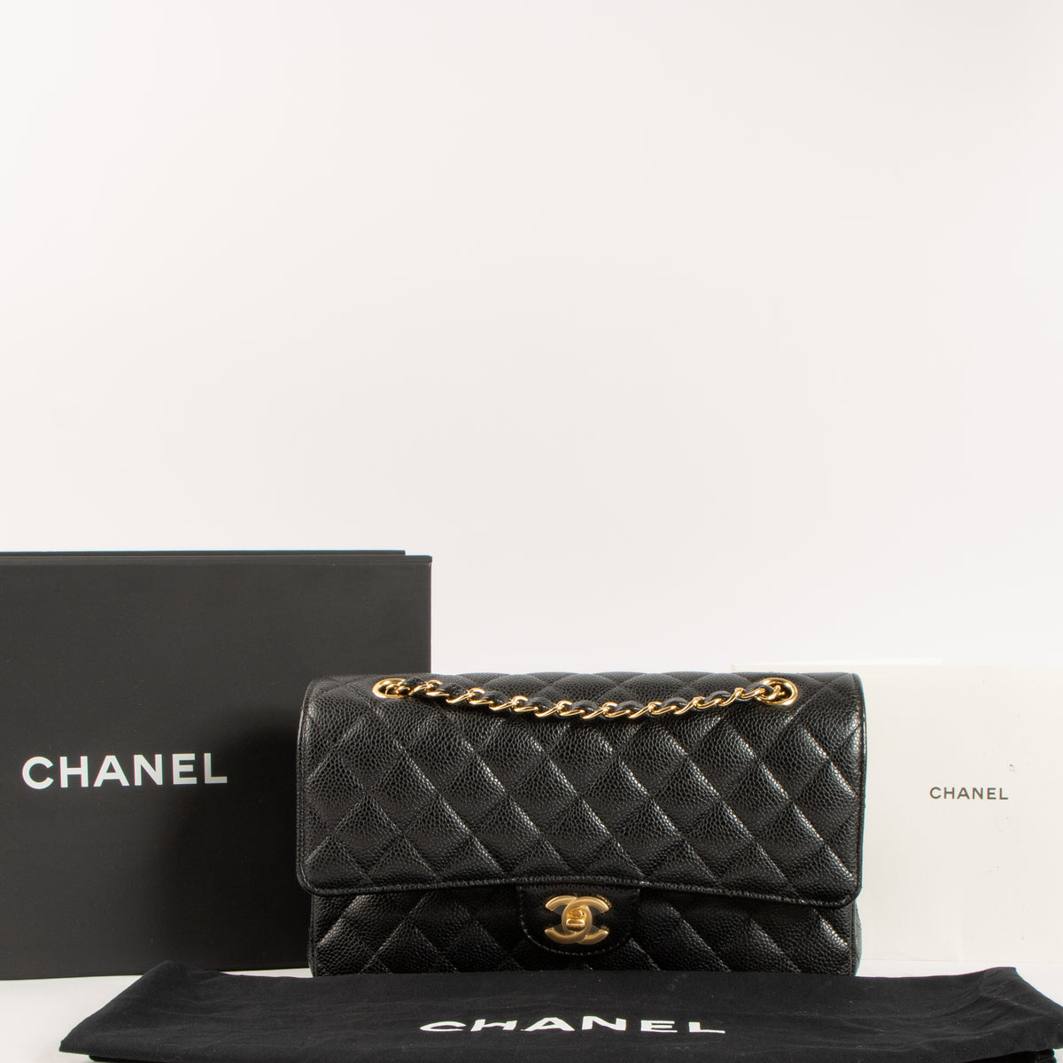 Shop this authentic Chanel Black Caviar Medium Classic 11.12 Handbag Pre-Loved on Labellov.com