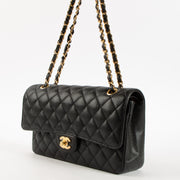 Shop this authentic Chanel Black Caviar Medium Classic 11.12 Handbag Pre-Loved on Labellov.com