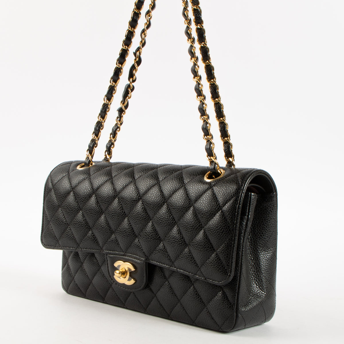 Shop this authentic Chanel Black Caviar Medium Classic 11.12 Handbag Pre-Loved on Labellov.com