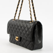 Shop this authentic luxury Chanel Black Caviar Medium Classic 11.12 Handbag Pre-Loved on Labellov.com