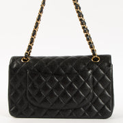 Shop this authentic luxury Chanel Black Caviar Medium Classic 11.12 Handbag Pre-Loved on Labellov.com