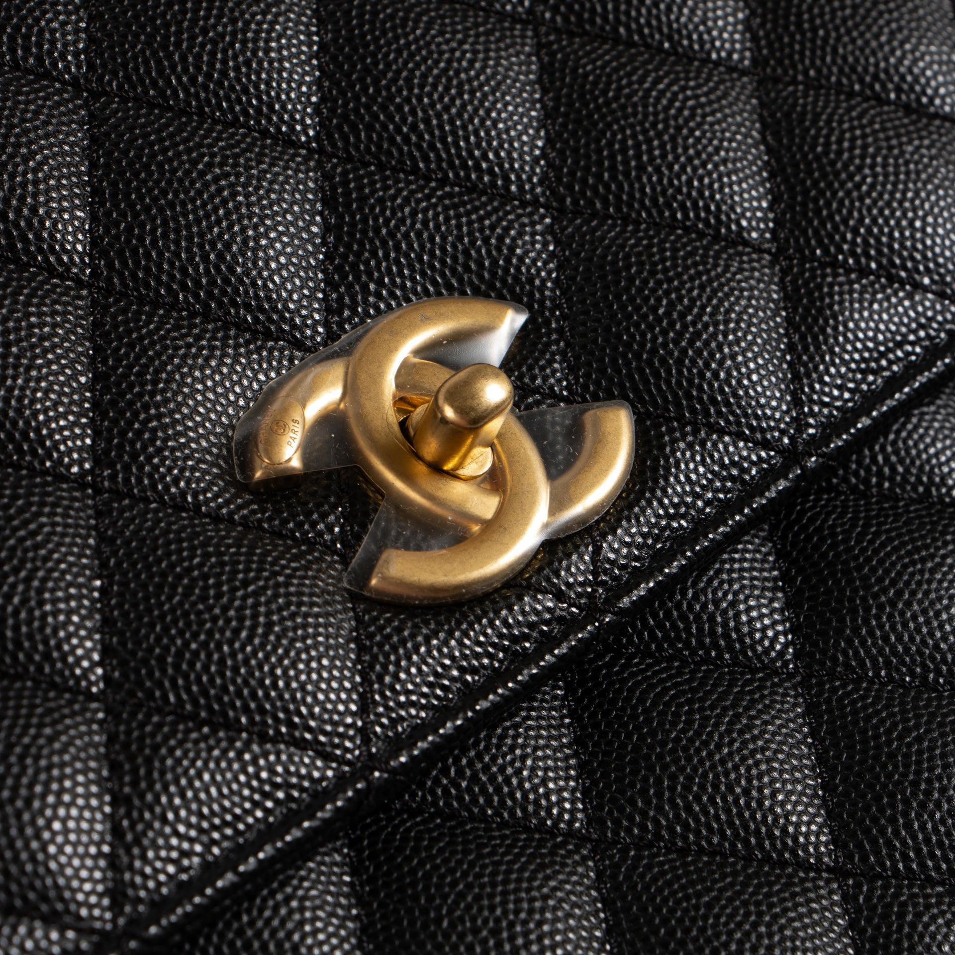 Shop the authentic Chanel Black Caviar Medium Coco Handle Bag on Labellov.com !