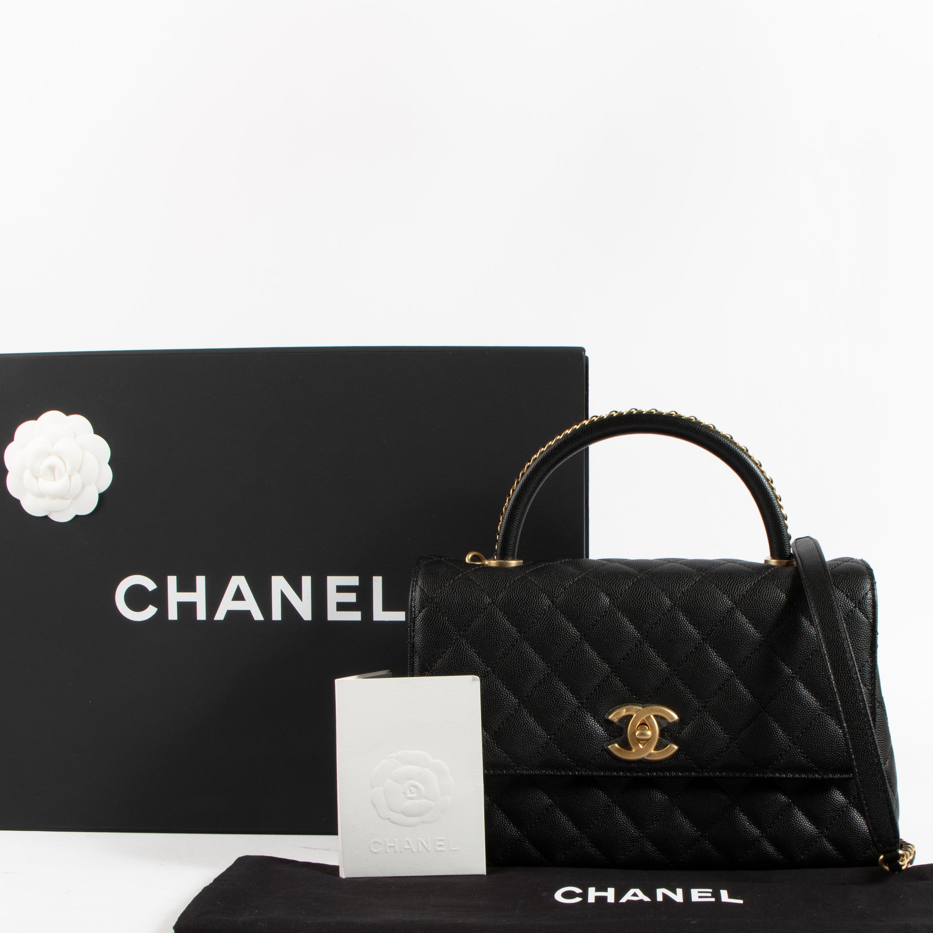 Shop the authentic Chanel Black Caviar Medium Coco Handle Bag on Labellov.com !