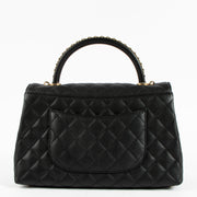 Shop the authentic Chanel Black Caviar Medium Coco Handle Bag on Labellov.com !