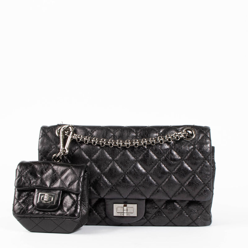 Shop this authentic Chanel Black Aged Calfskin Medium 2.55 Reissue Bag with Micro Pouch pre-loved on Labellov.com 