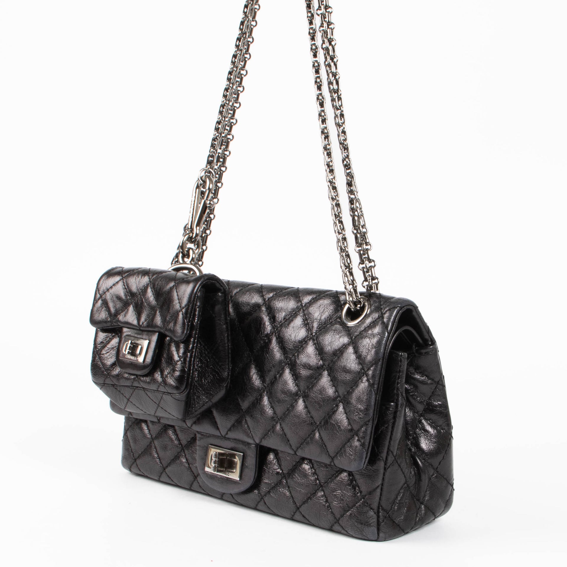 Shop this authentic Chanel Black Aged Calfskin Medium 2.55 Reissue Bag with Micro Pouch pre-loved on Labellov.com 
